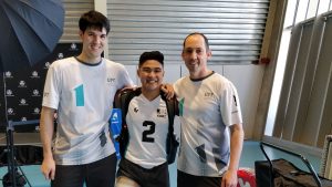 Vancouver chiropractor and physiotherapist with a client at an on-site volleyball tournament