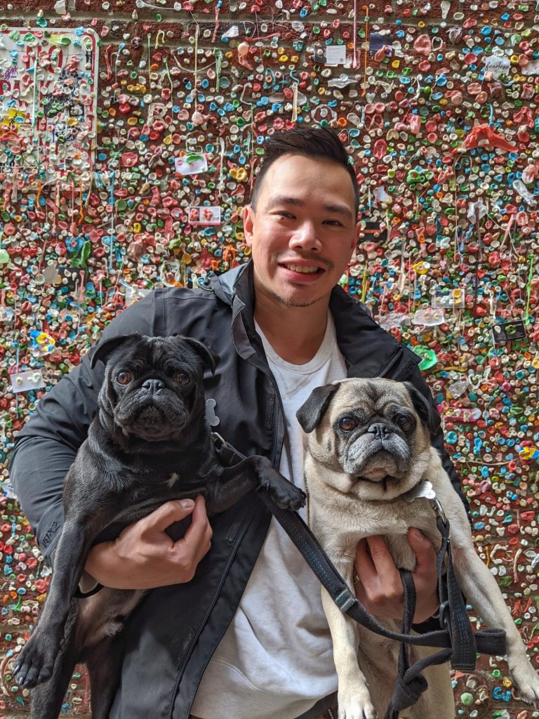 Henry a Vancouver Physiotherapist at Lift Clinic with his pug dogs Bruce and Jet