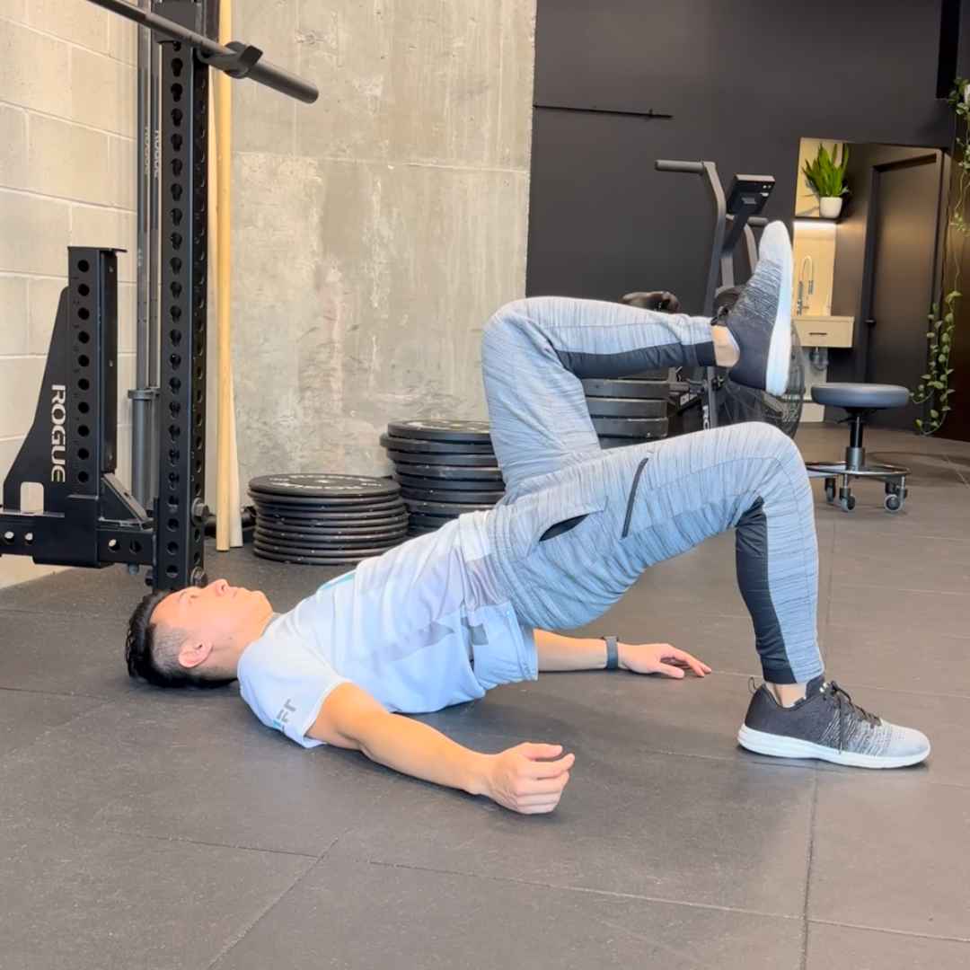 Vancouver Physiotherapist performing Glute Bridge